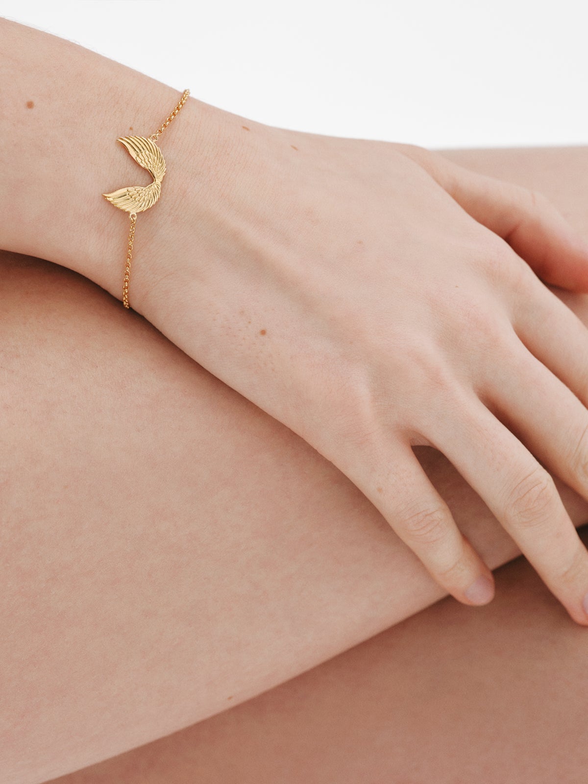 Pulsera de plata 925 bañada en oro amarillo de 18K con alas