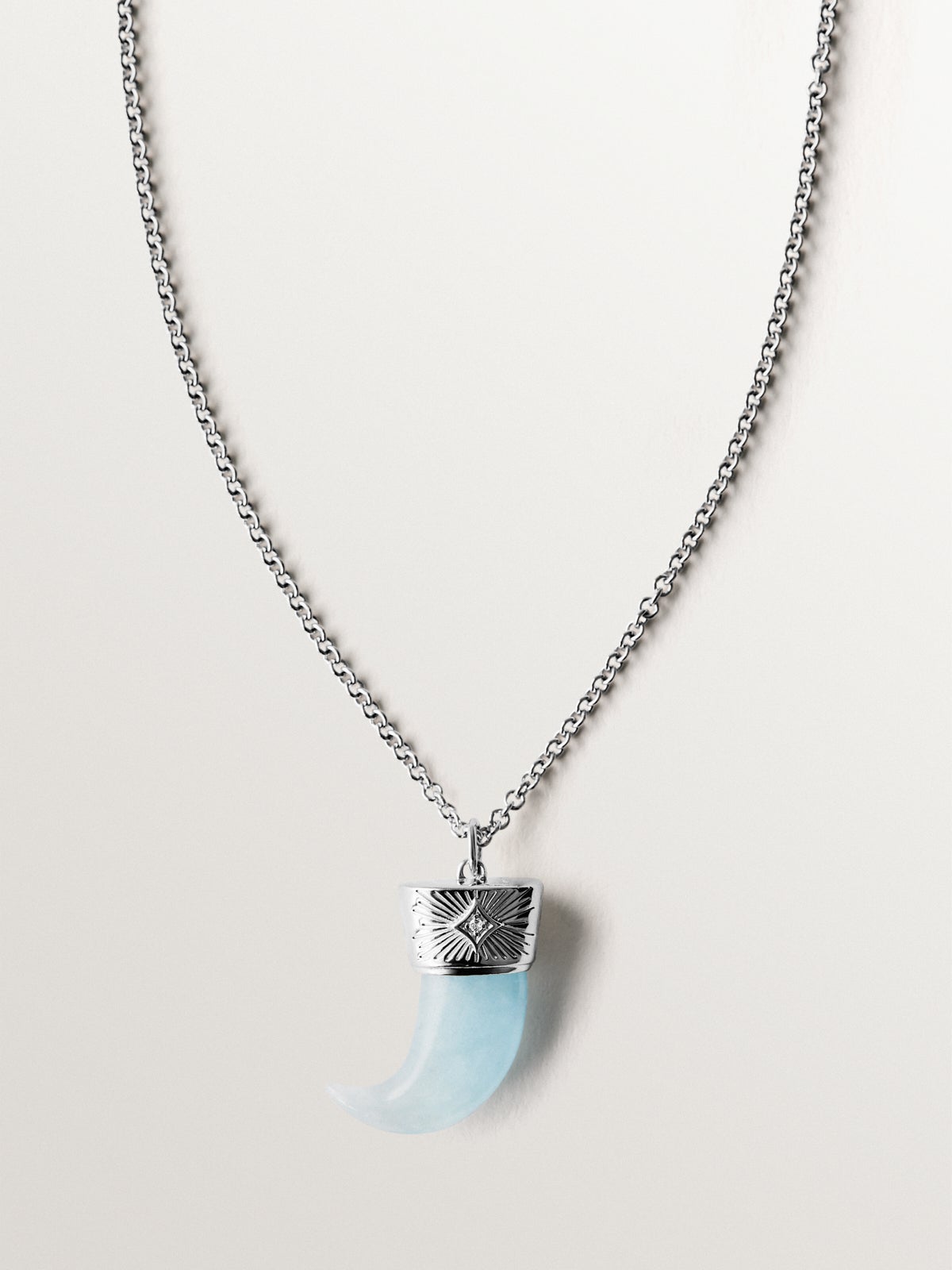 Colgante de plata 925 con colmillo de aguamarina azul y topacio blanco