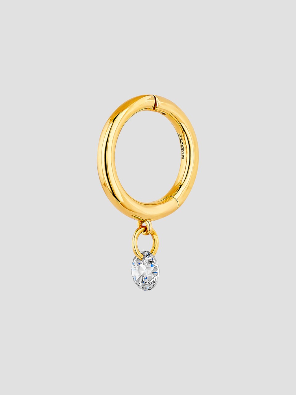 Individual small hoop earring made of 18K yellow gold with a 0.08 cts diamond.