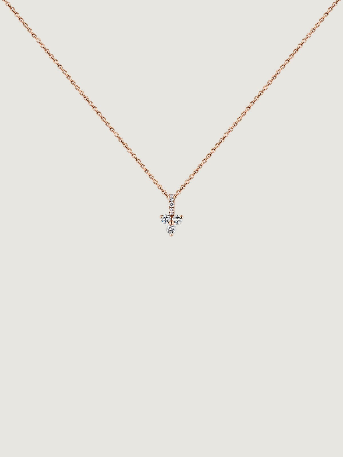 Colgante de oro rosa de 18K con cruz de diamantes 0,09 cts