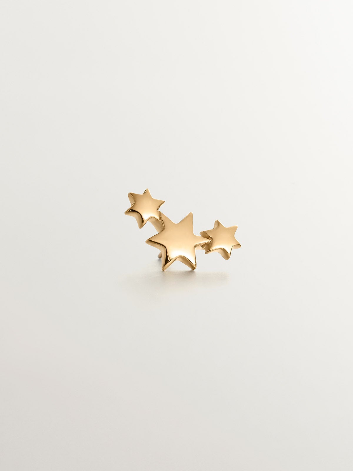 Pendiente individual de oro amarillo de 9K con estrellas