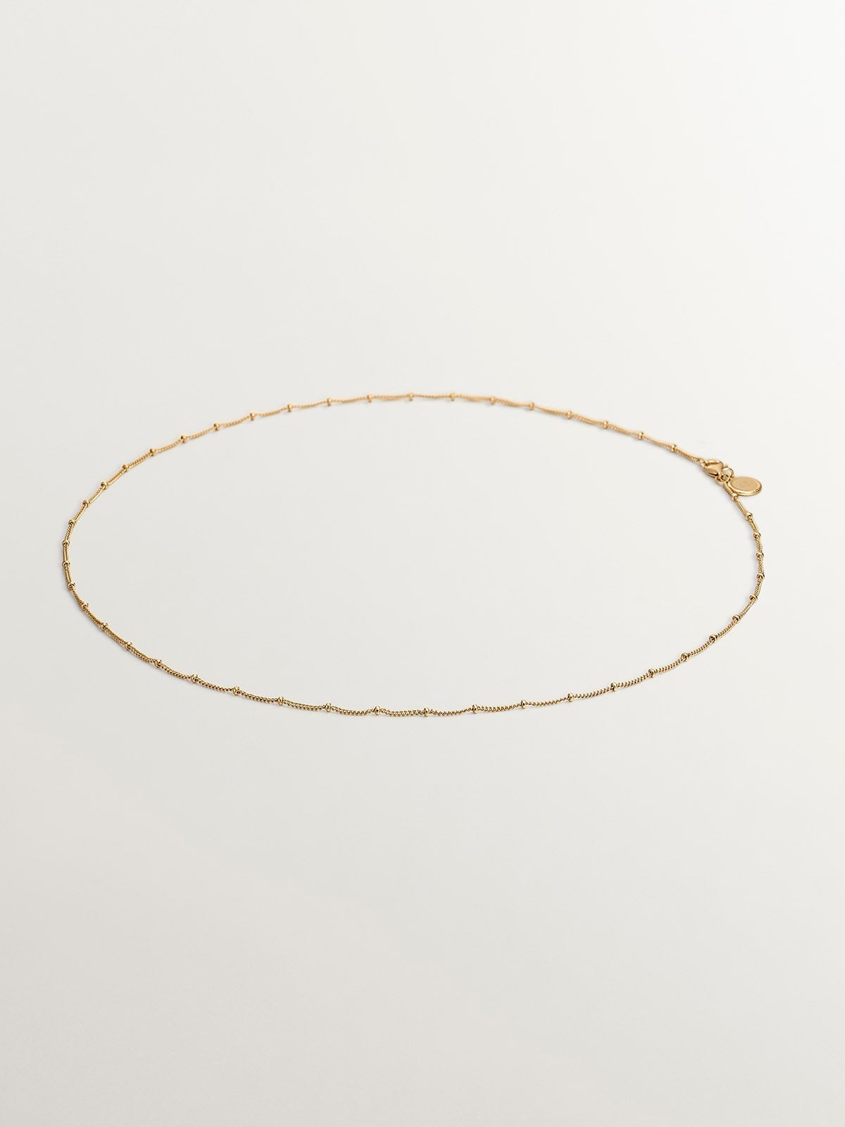 Cadena de plata 925 bañada en oro amarillo de 18K con bolitas
