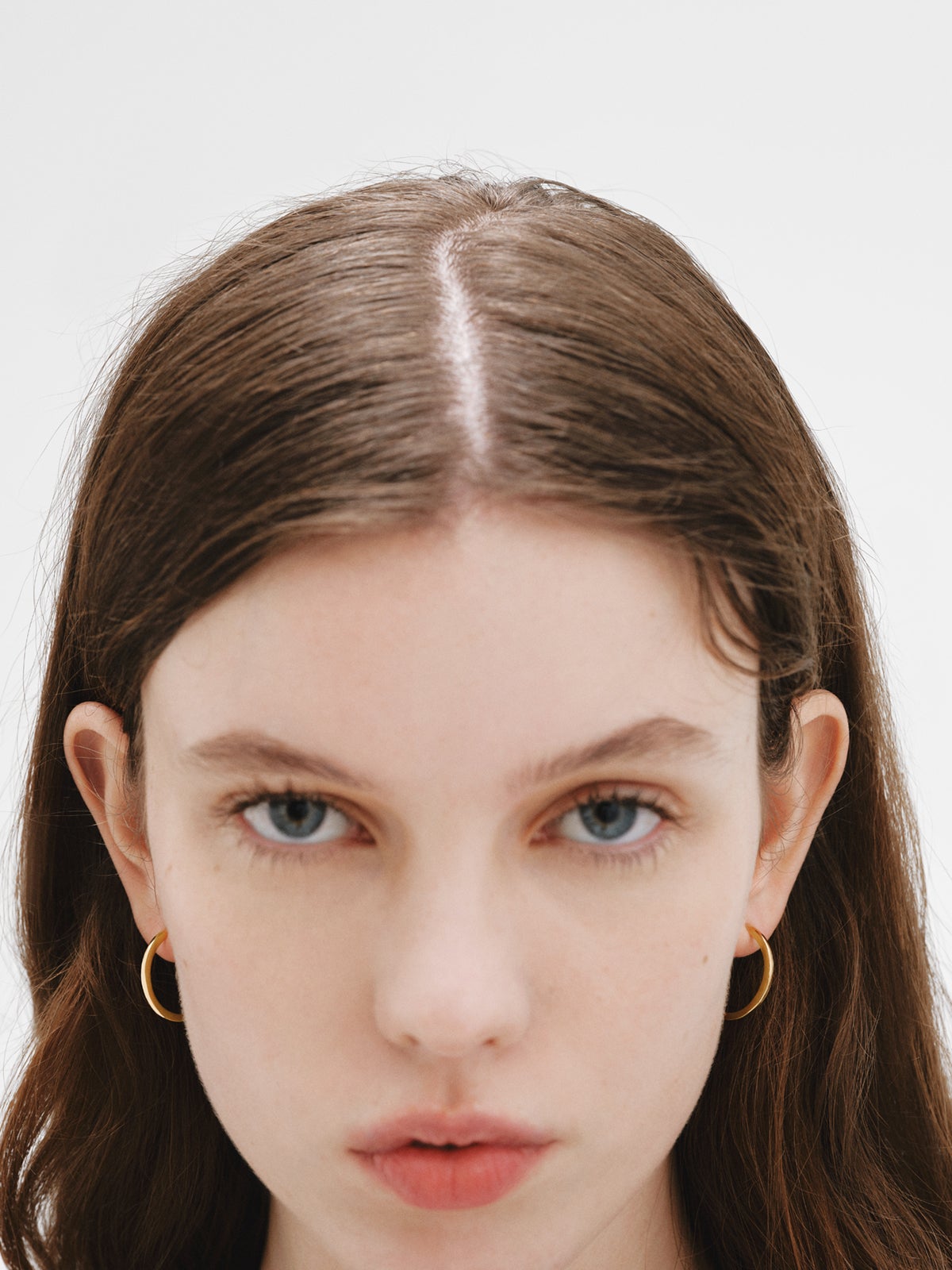 Boucles d'oreilles créoles moyennes en argent 925 plaqué or jaune 18K.