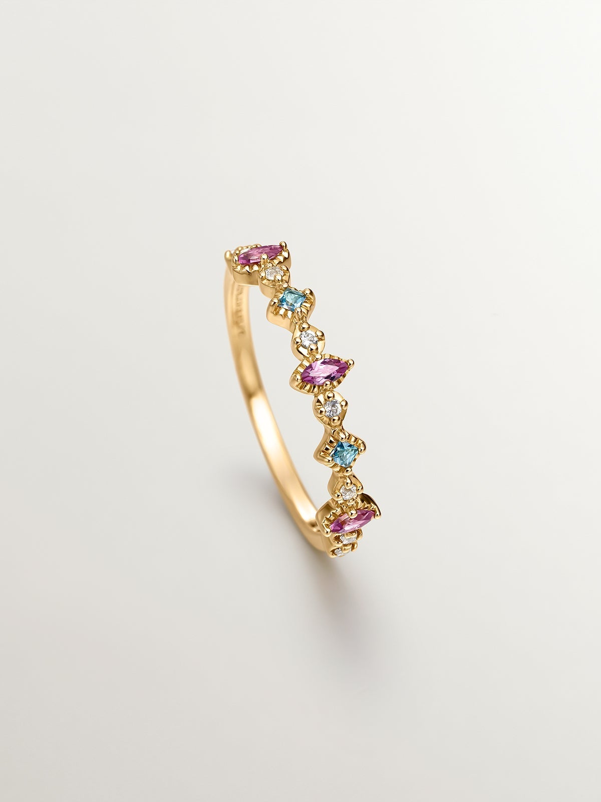 Anillo de plata 925 bañada en oro amarillo de 18K con topacios y rodolitas