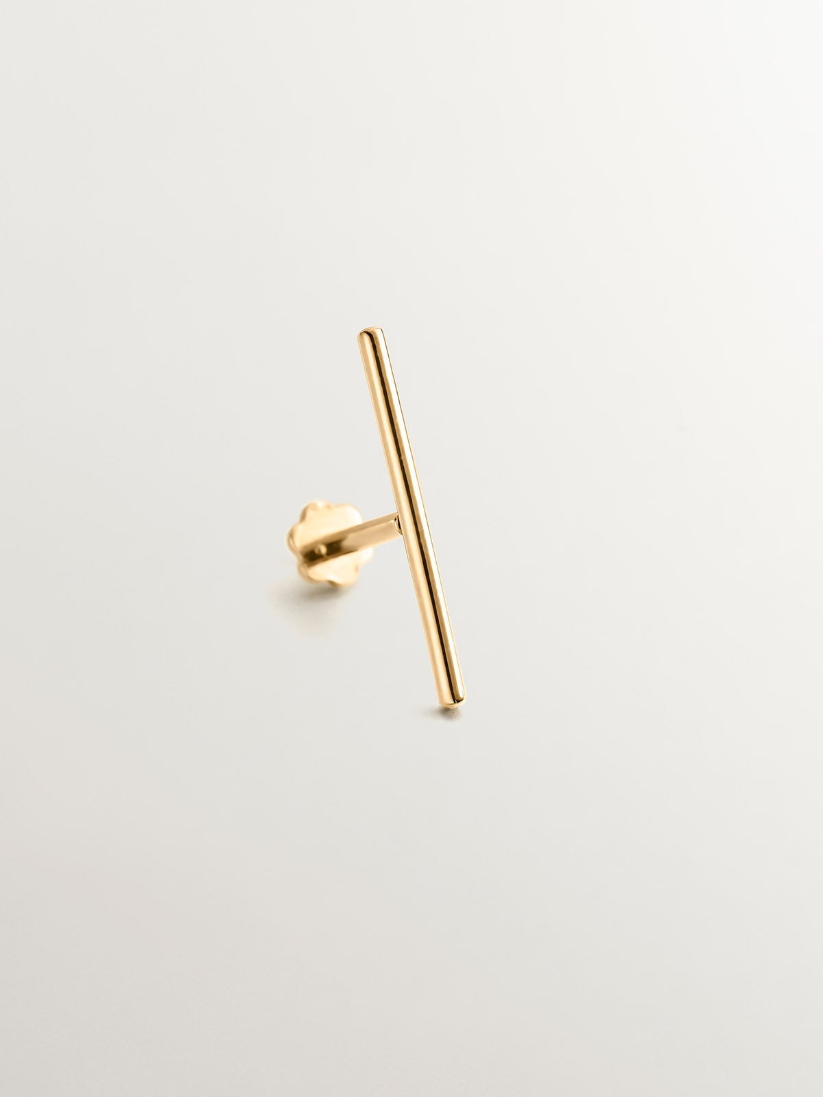 Piercing barra industrial de oro amarillo de 18K