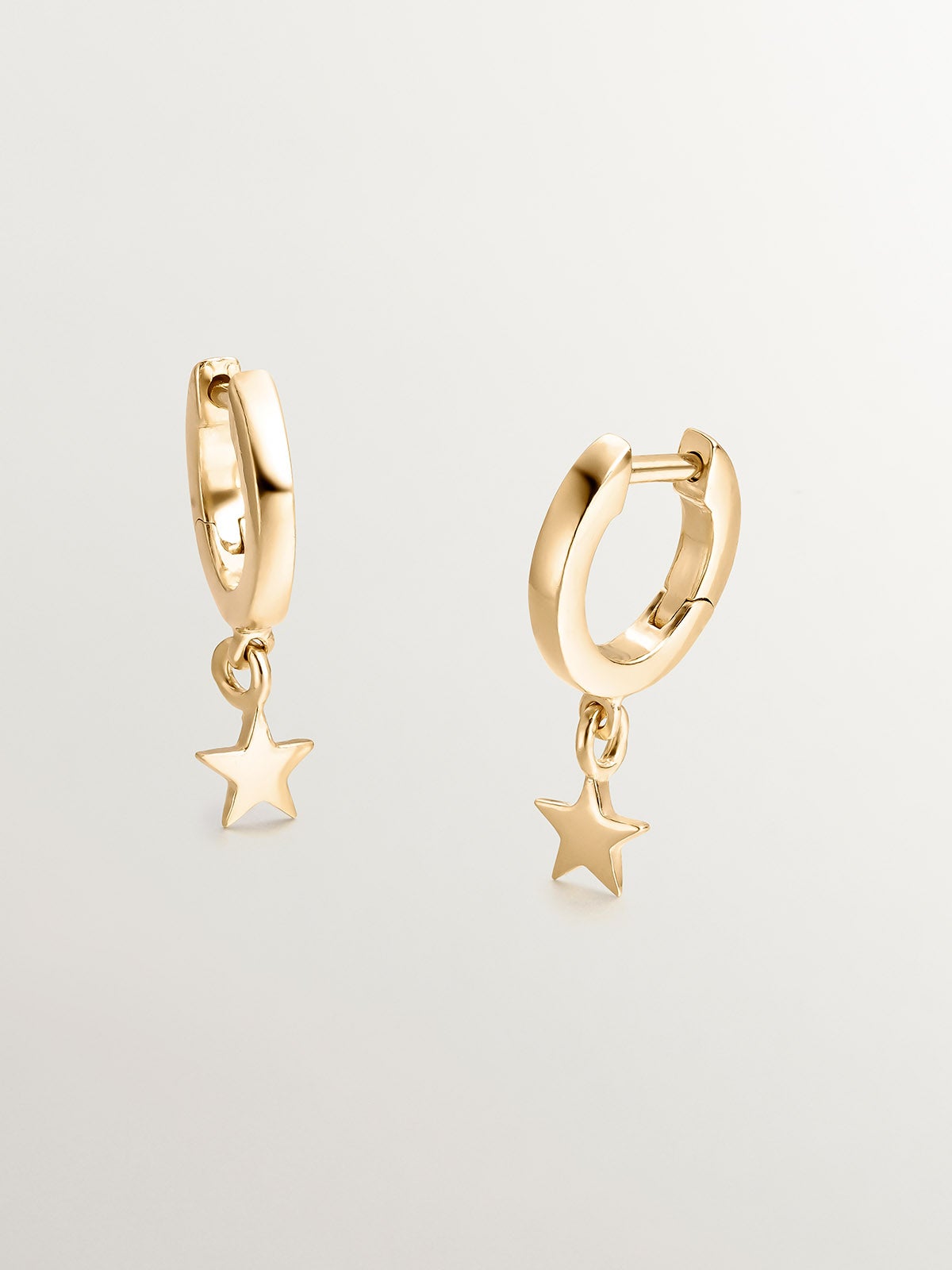 Pendientes de aro pequeños de plata 925 bañada en oro amarillo de 18K con estrella