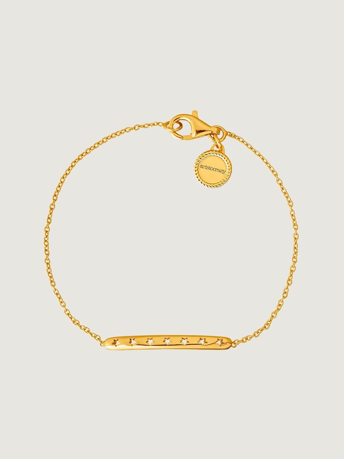 Pulsera tipo esclava de plata 925 bañada en oro amarillo de 18K con estrellas