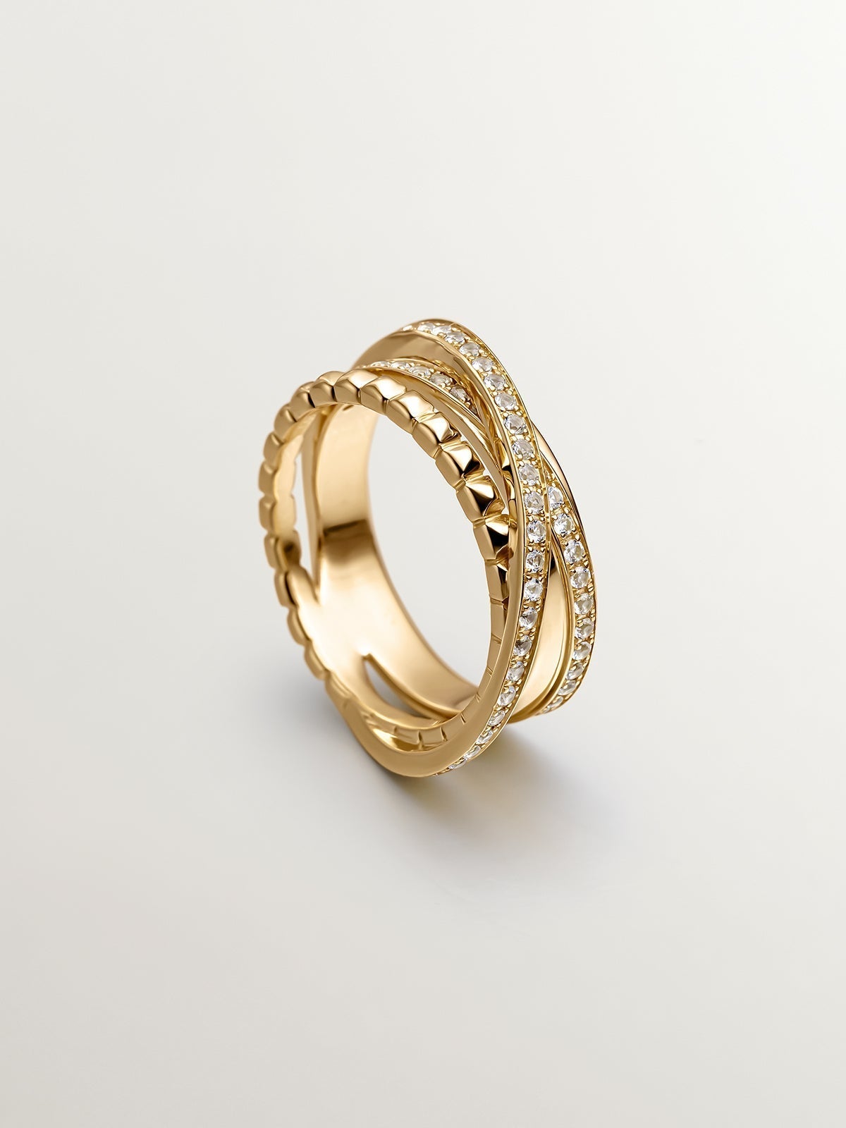 Anillo multibrazo cruzado de plata 925 bañada en oro amarillo de 18K con topacios