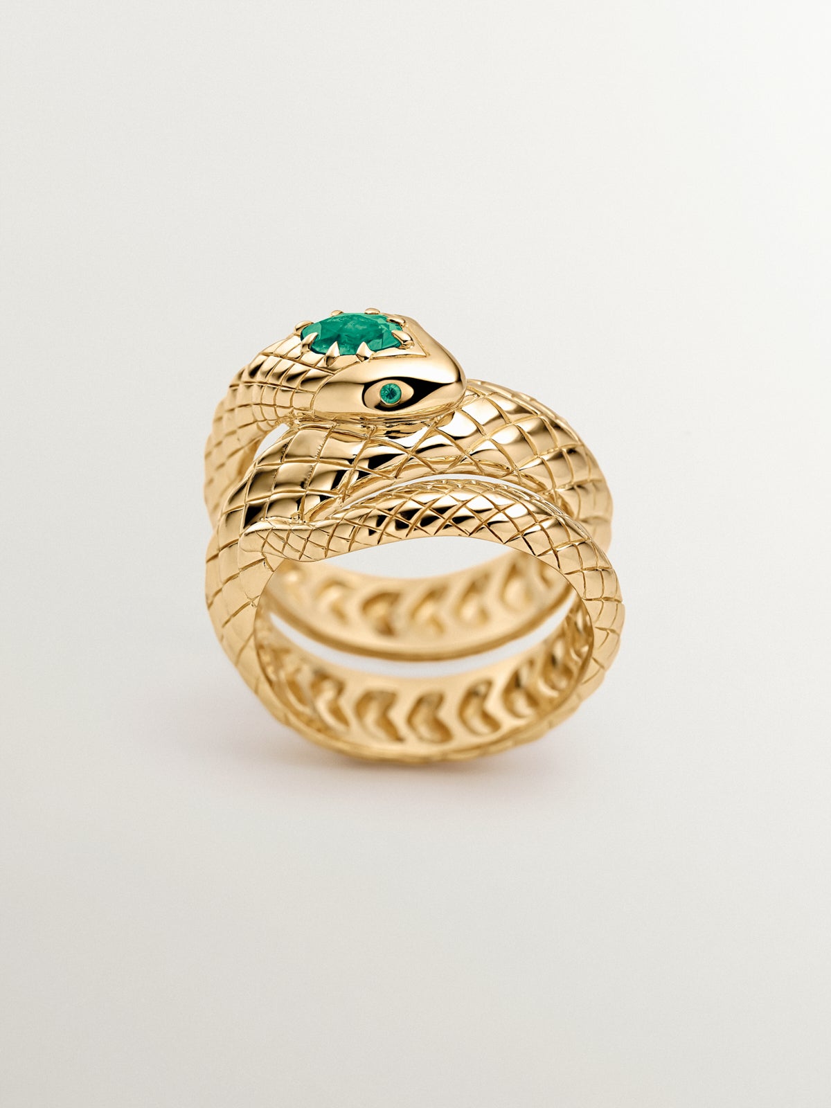 Anillo de plata 925 bañada en oro amarillo de 18K con ónix verde y con forma de serpiente