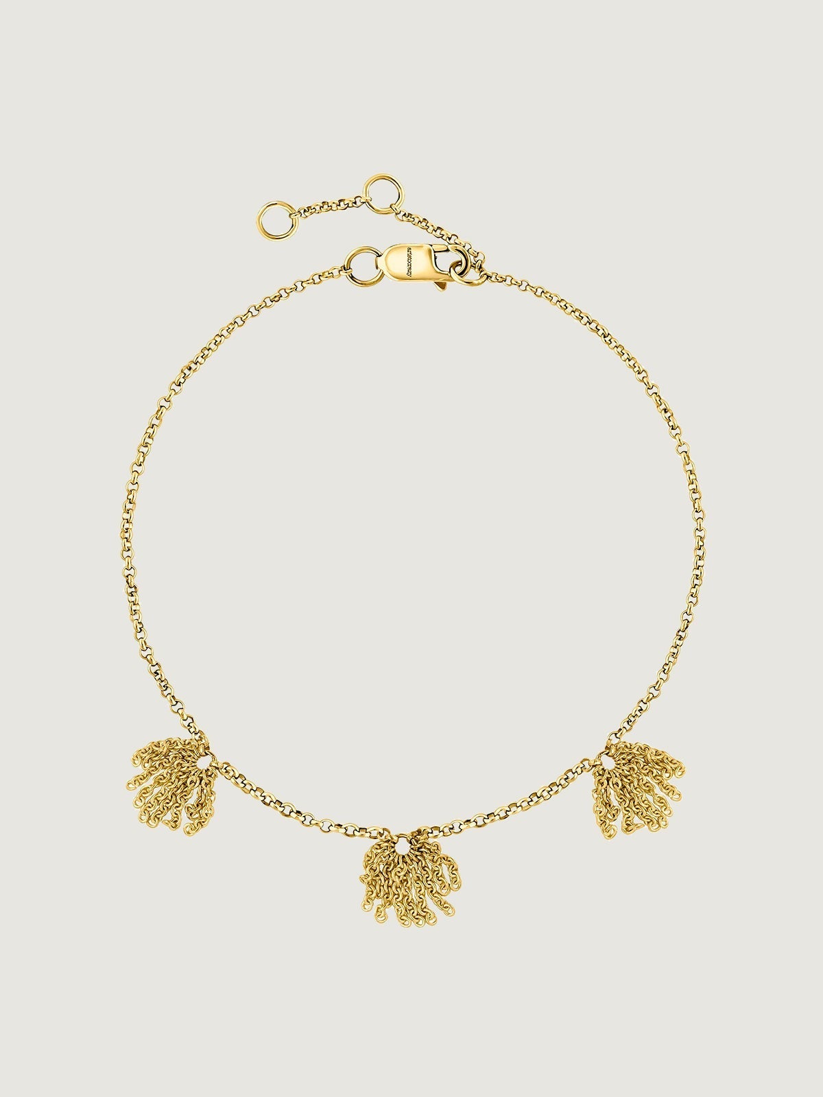 Pulsera de oro amarillo de 9K con pompones de cadena