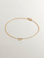 Pulsera de oro amarillo de 9K con corazones entrelazados