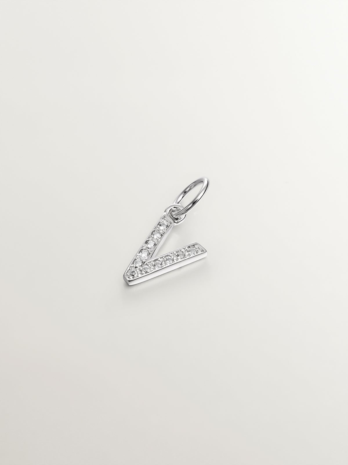 Charm de plata 925 y topacios blancos inicial V