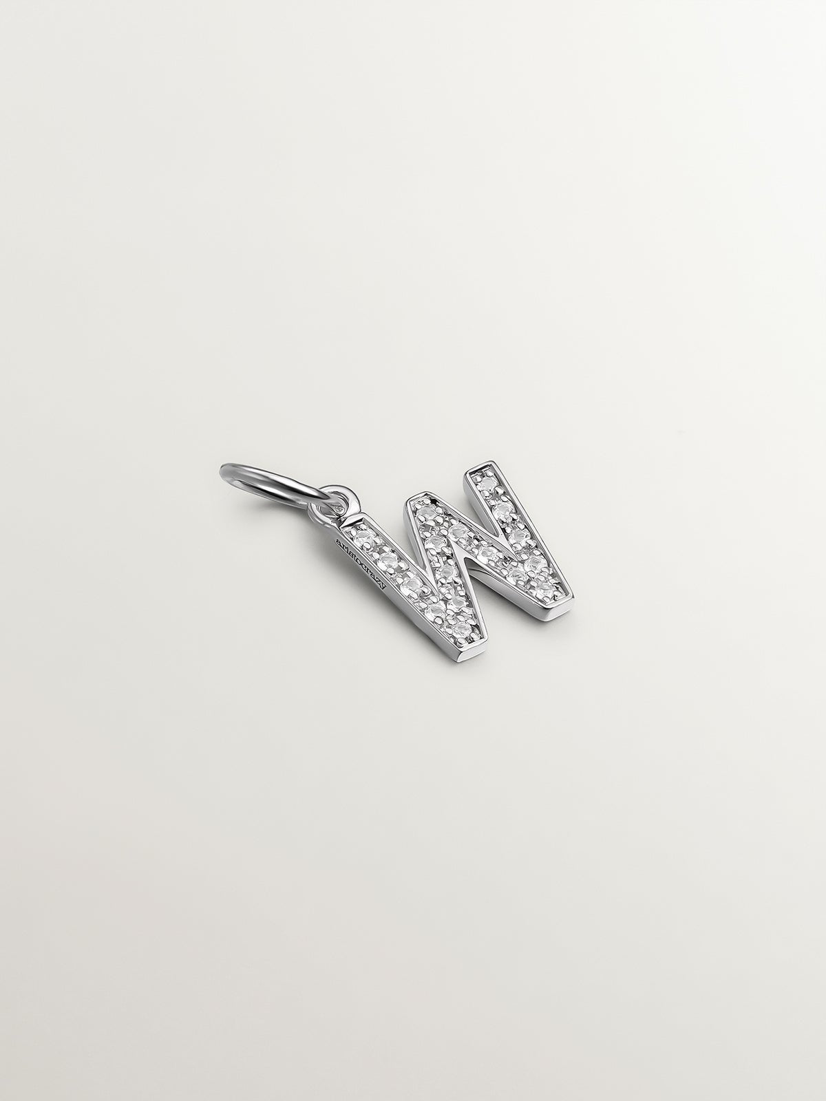 Charm de plata 925 y topacios blancos inicial W