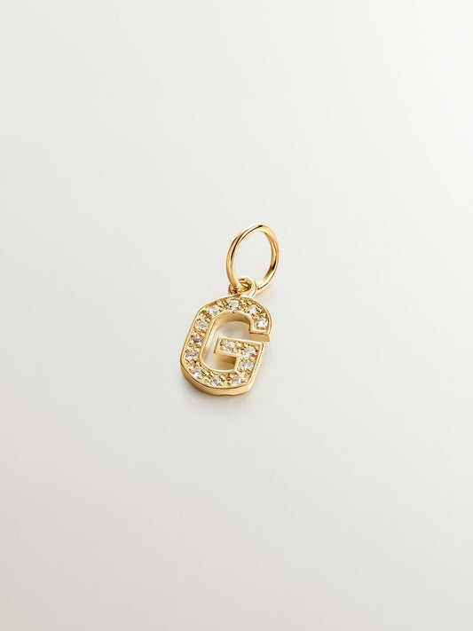 Charm de plata 925 bañada en oro amarillo de 18K y topacios blancos inicial G