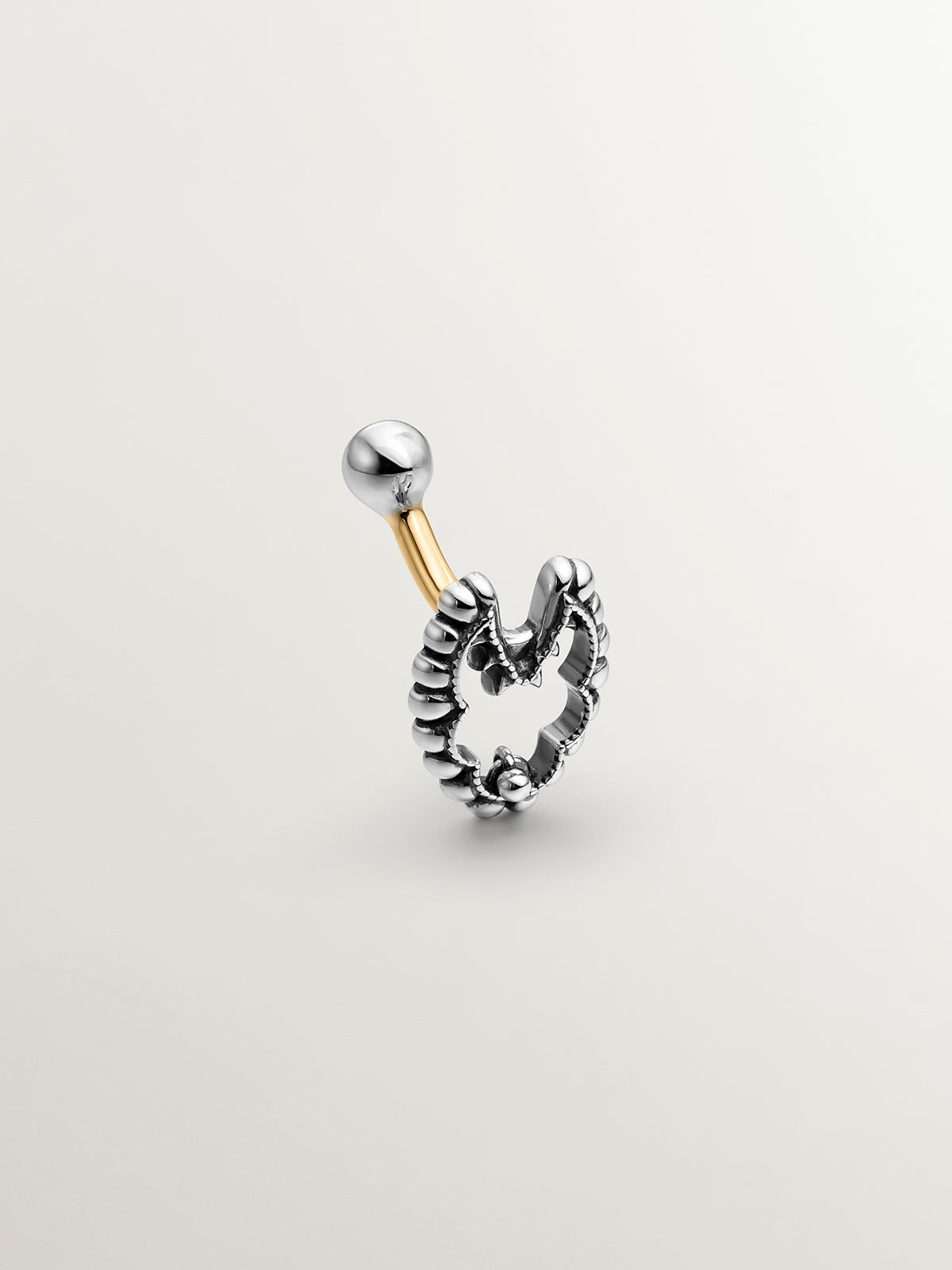 Piercing del ombligo de plata 925 y oro amarillo de 18K