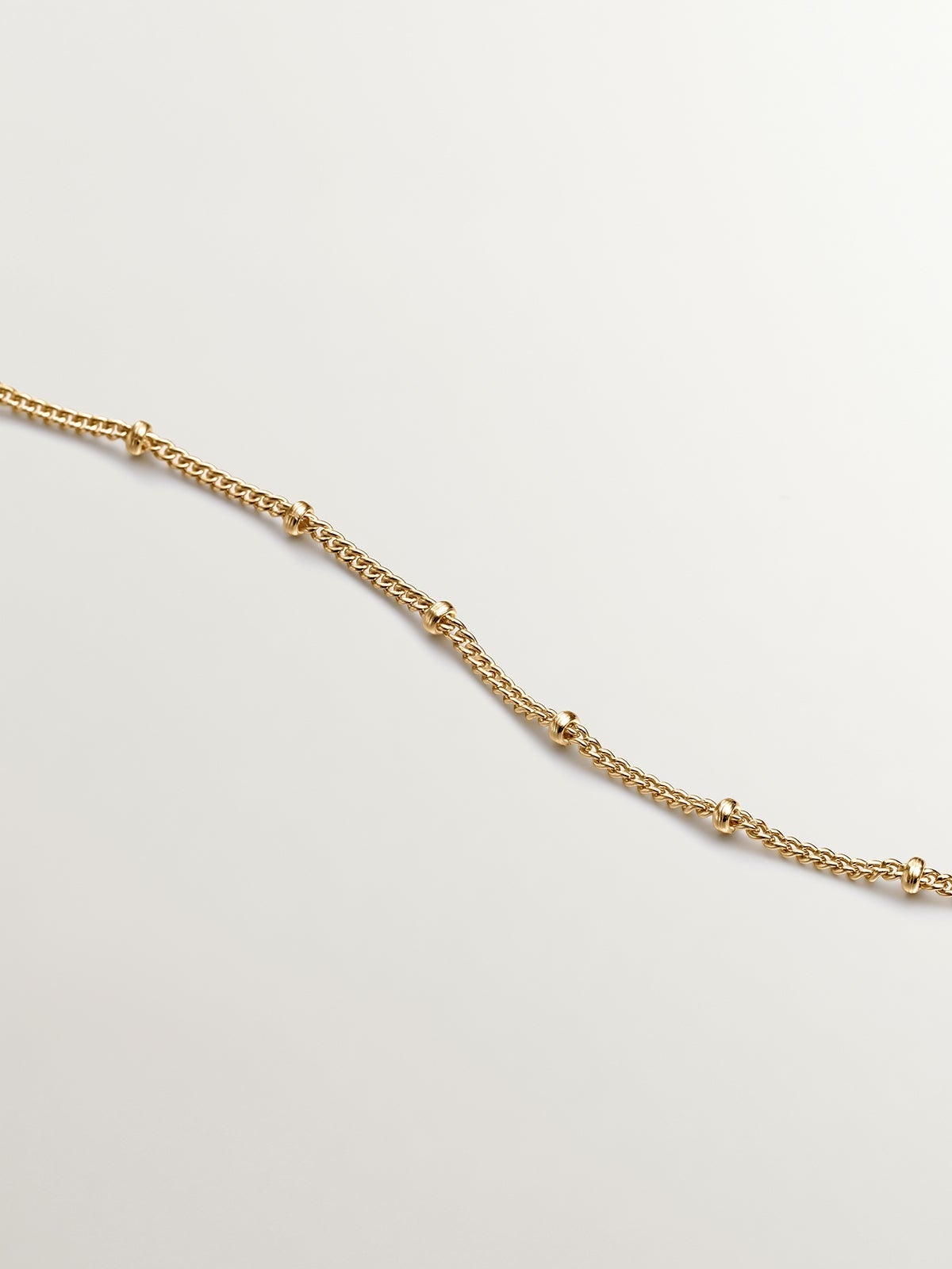 Tobillera de plata 925 bañada en oro amarillo de 18K con bolitas