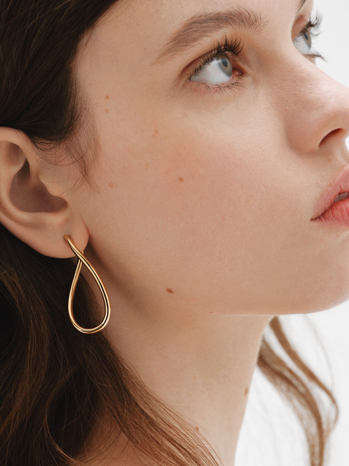 Boucles d'oreilles créoles ondulées en argent 925 plaqué en or jaune 18K