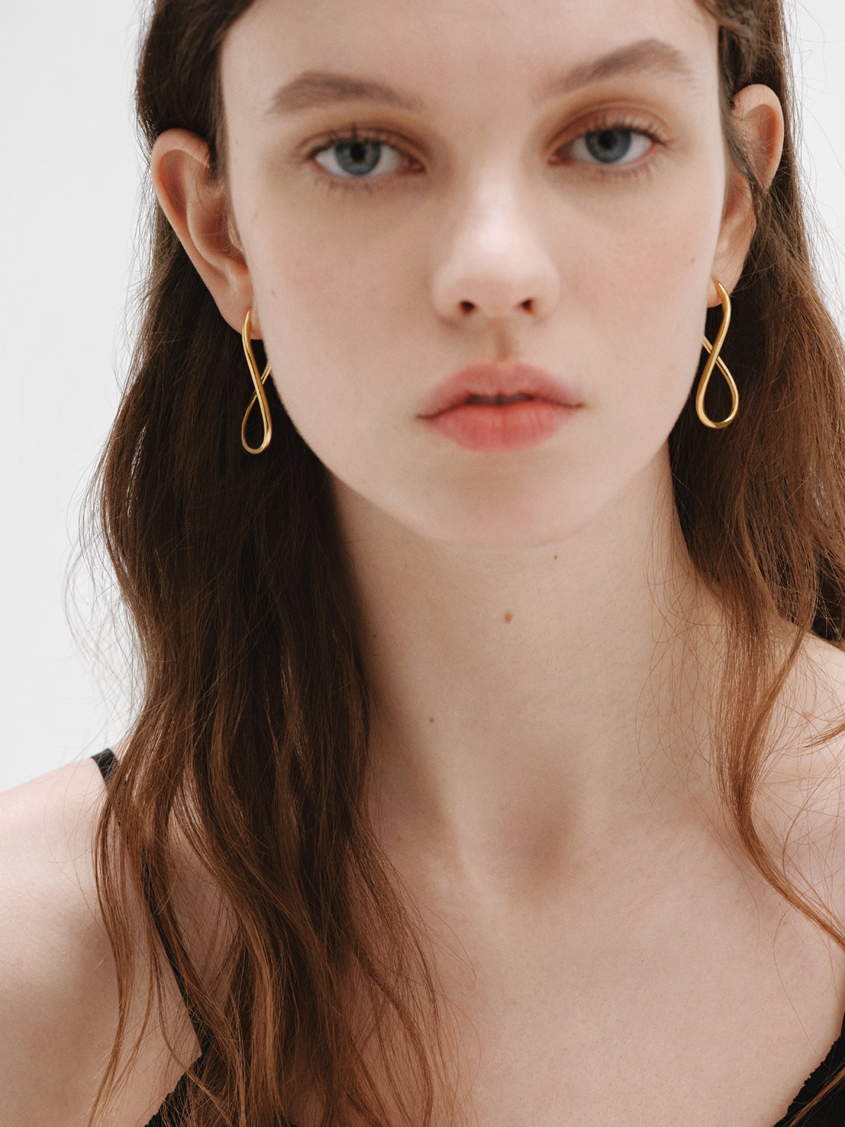 Boucles d'oreilles créoles ondulées en argent 925 plaqué en or jaune 18K