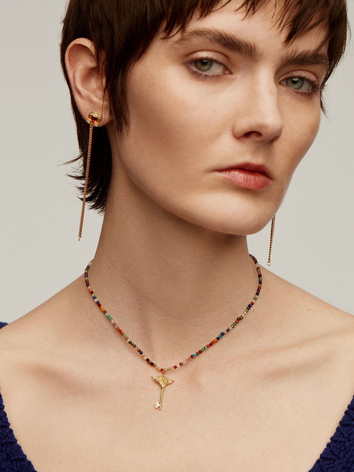 Charm de plata 925 bañada en oro amarillo de 18K con forma de llave