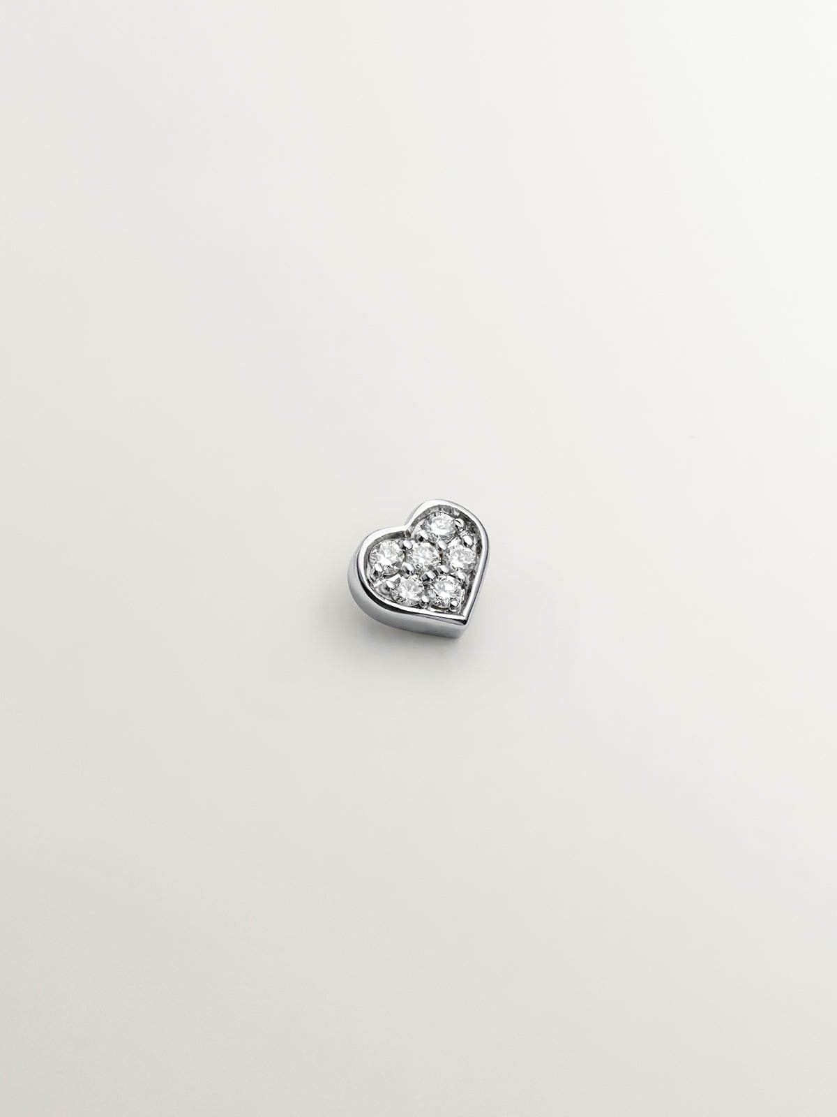 18K white gold heart-shaped piercing with 0.3 ct diamonds