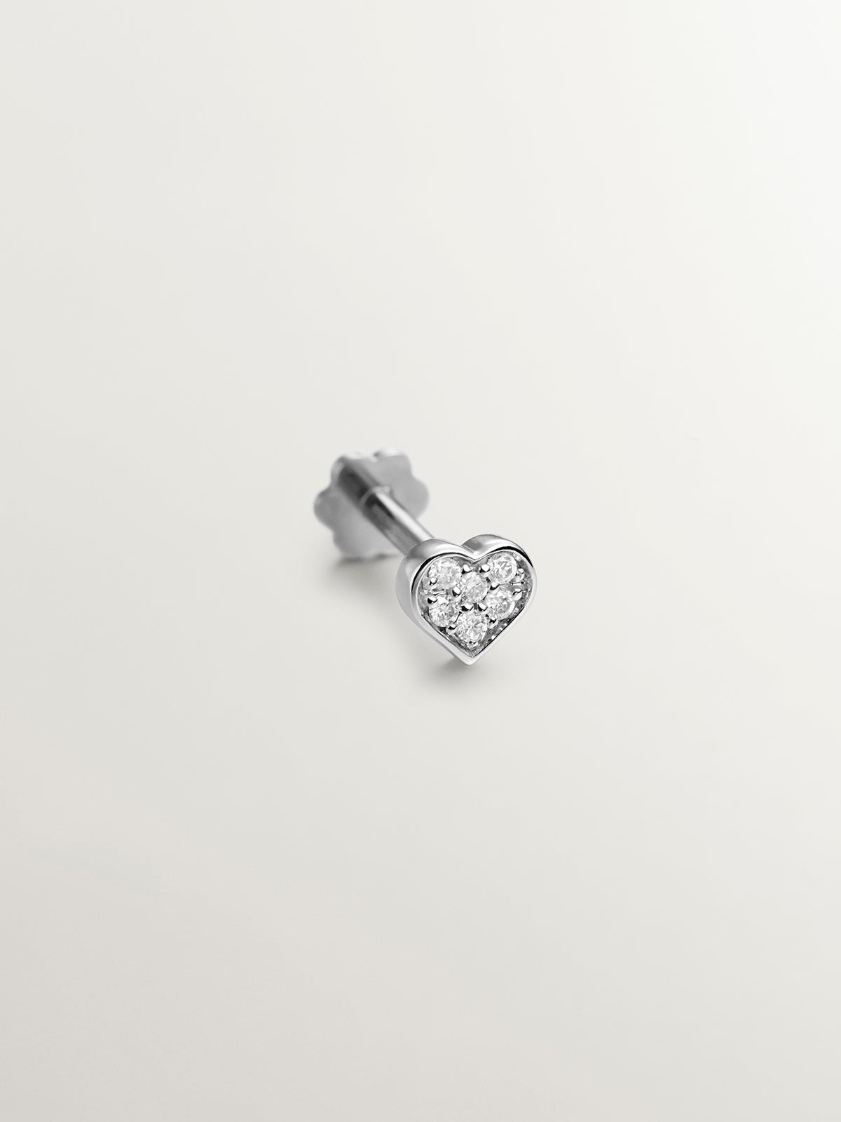 Pendiente individual de oro blanco de 18K con diamantes 0,3 cts