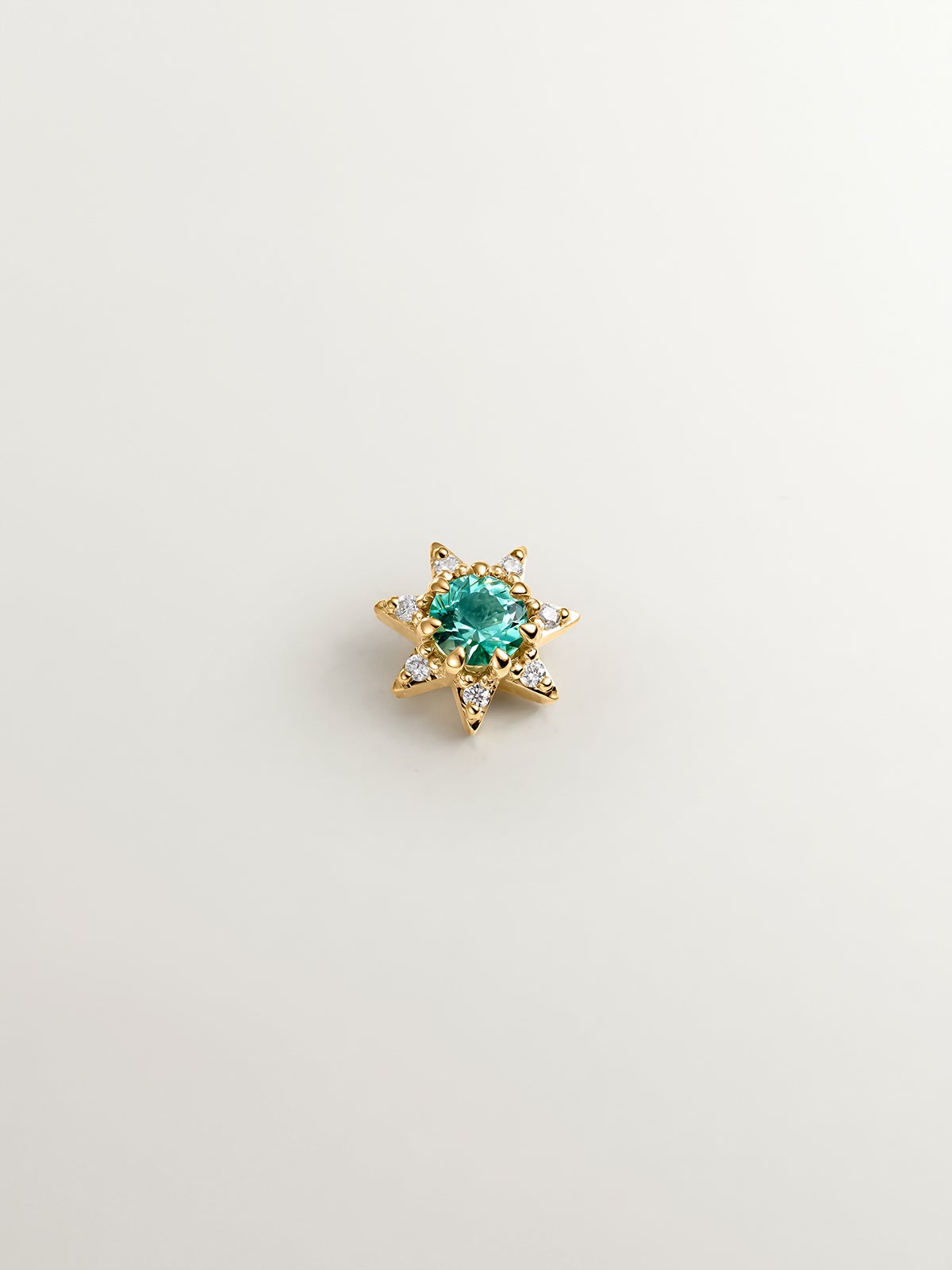 Piercing de oro amarillo de 18K con esmeralda y diamantes