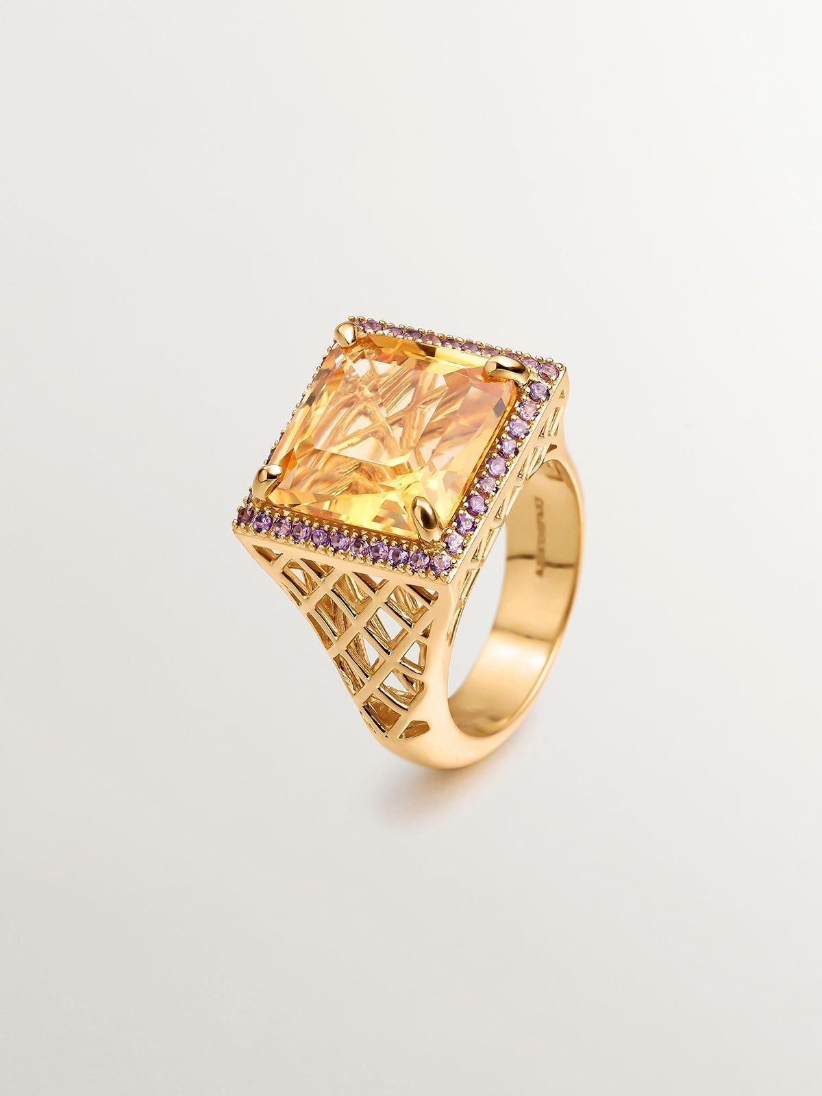 Anillo de plata 925 bañada en oro amarillo de 18K con granate naranja y amatistas moradas
