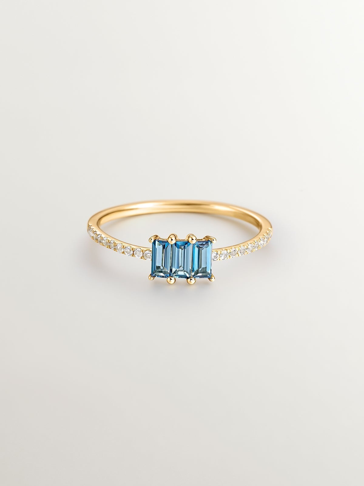 Anillo tresillo de plata 925 con topacios azul london y topacios blancos