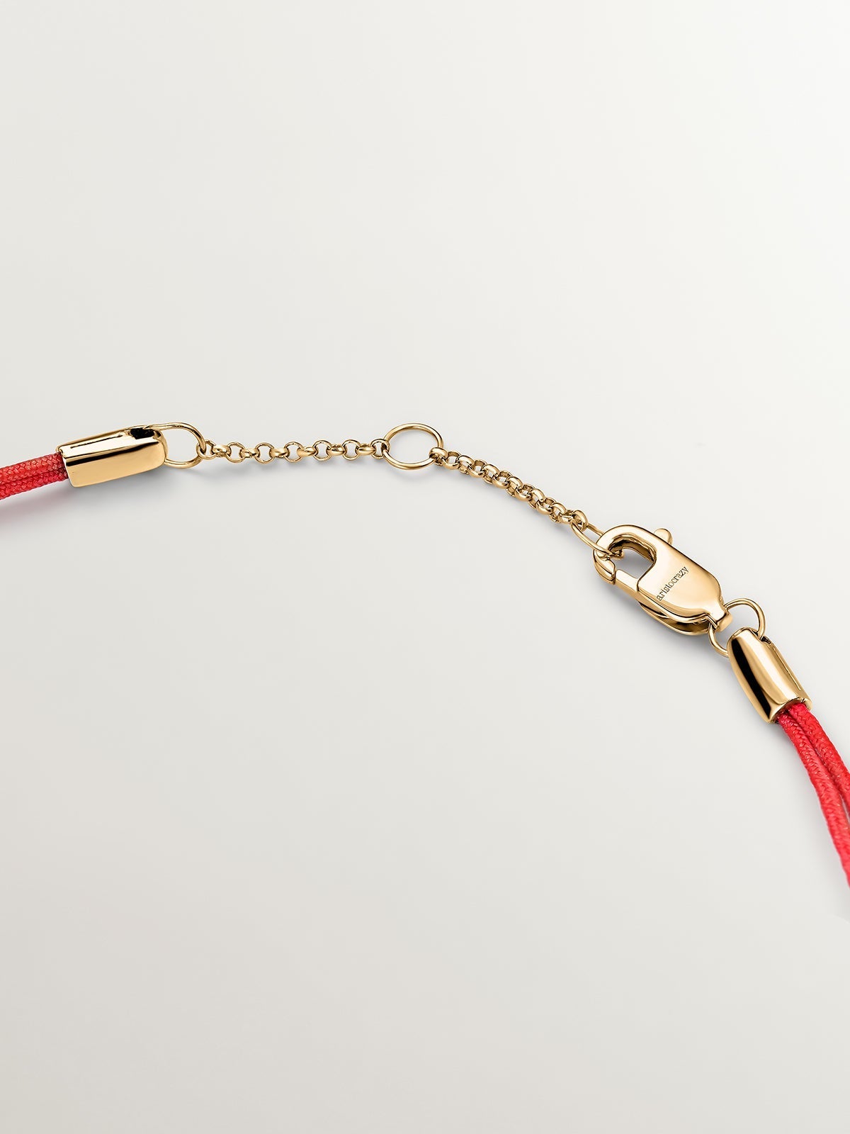 Pulsera de hilo y oro amarillo de 18K con diamantes