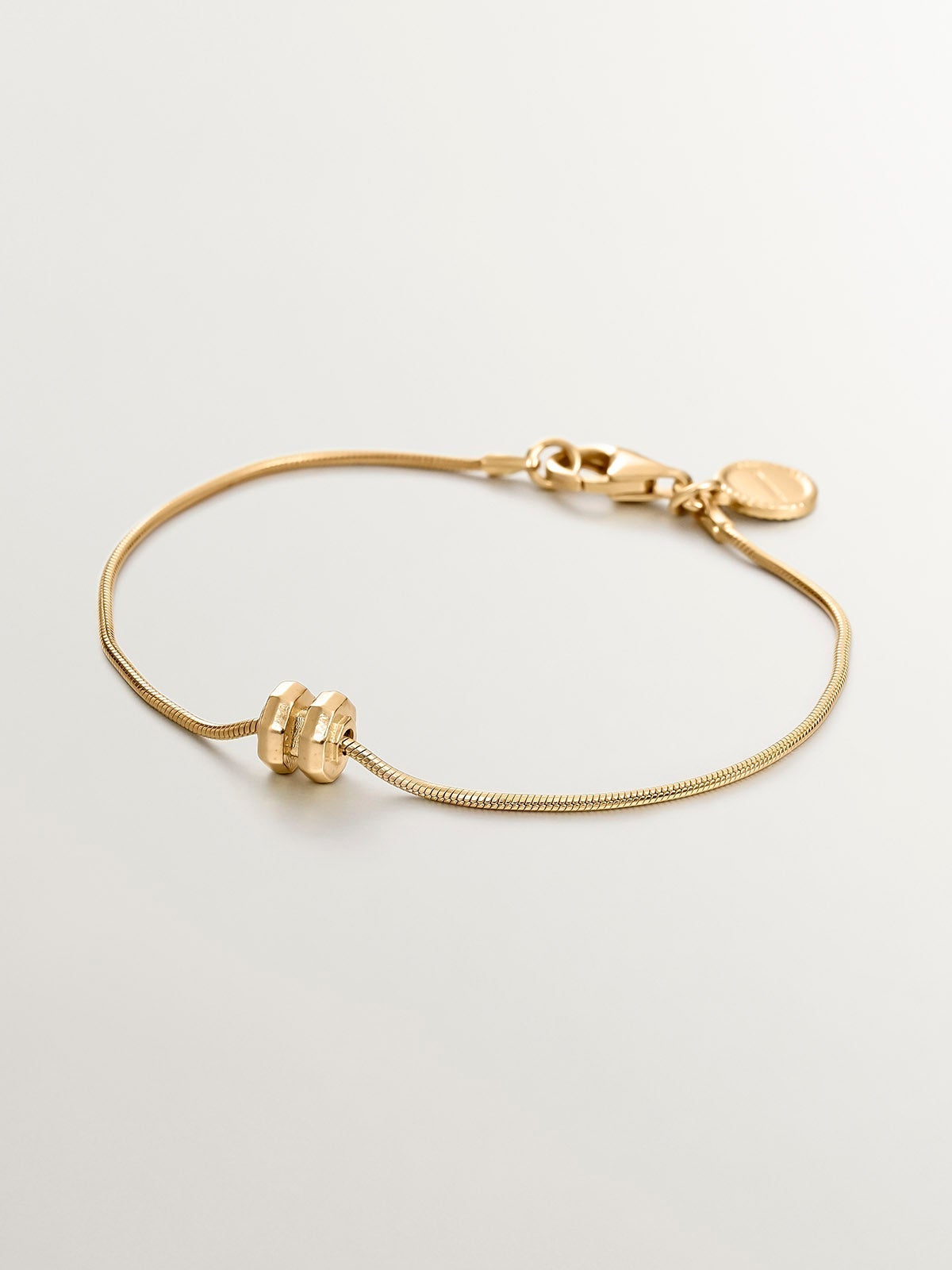 Pulsera de plata 925 bañada en oro amarillo de 18K de eslabones barbado con motivo geométrico
