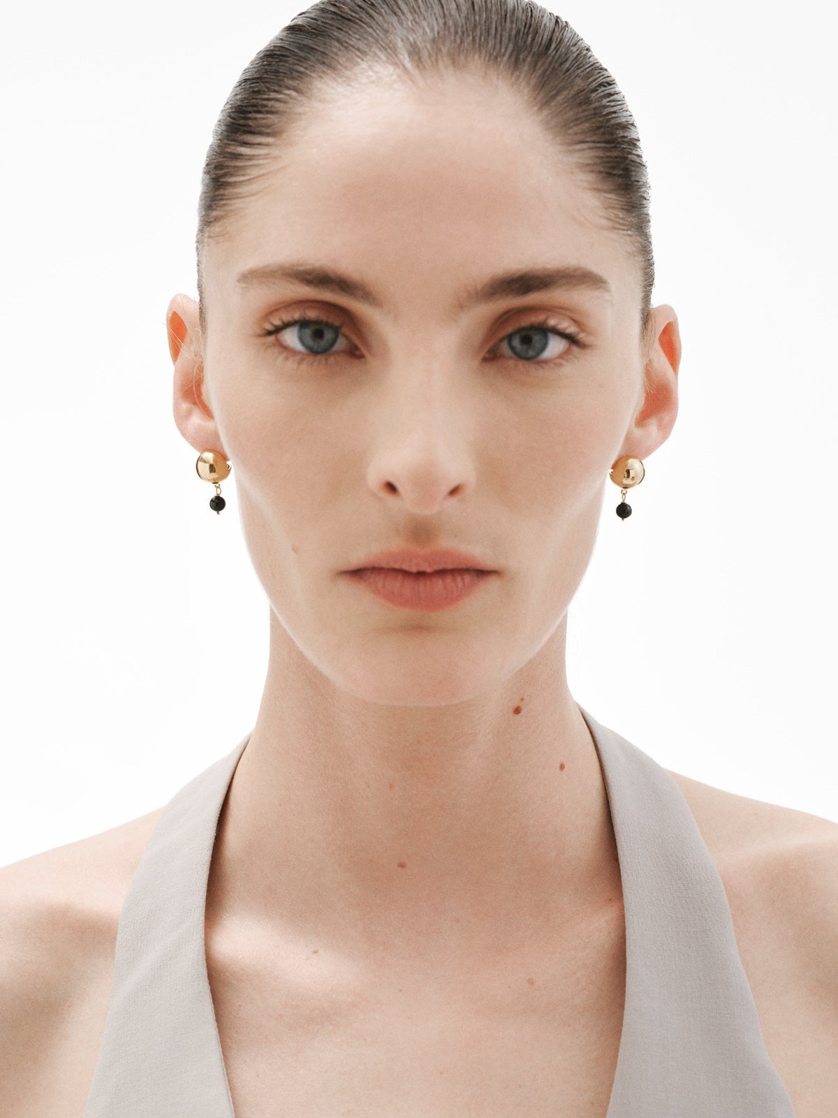 Pendientes de plata 925 bañada en oro amarillo de 18K con ónix negro