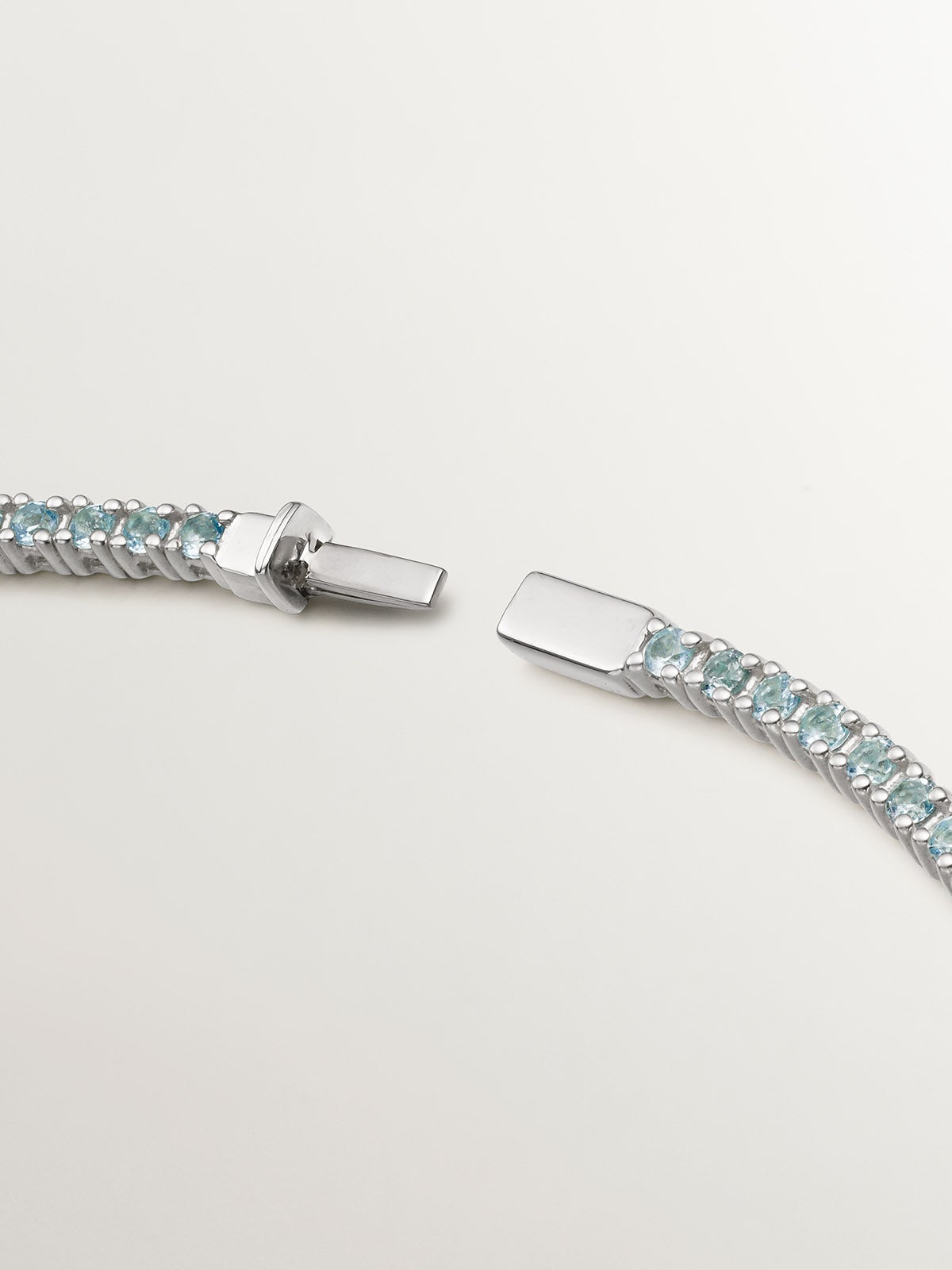 Pulsera de plata 925 bañada en oro amarillo de 18K con topacios azul swiss