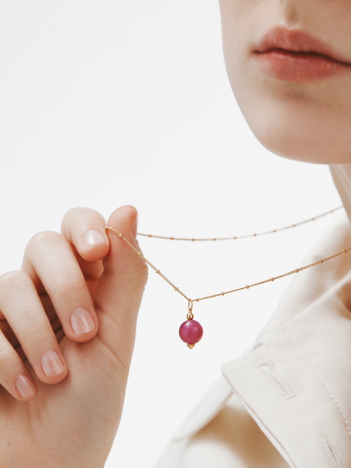 Red jade charm with 925 silver ring bathed in 18k yellow gold