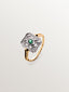 Anillo de oro blanco y oro amarillo de 18K con diamantes en talla brillante y esmeraldas en talla brillante