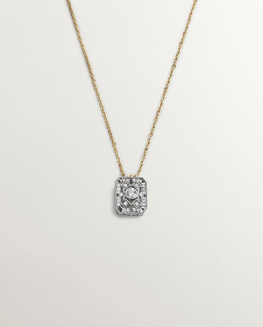 Colgante de oro blanco y amarillo de 18K con diamantes en talla brillante