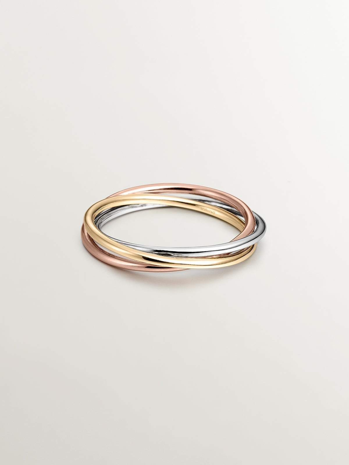 Anillo triple de oro blanco, amarillo y rosa de 9K