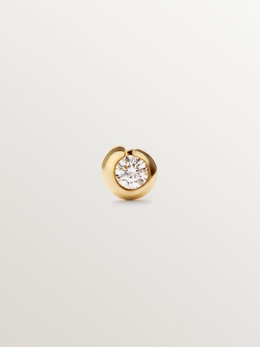Piercing individual de oro amarillo de 18K con diamante central blanco en talla brillante.