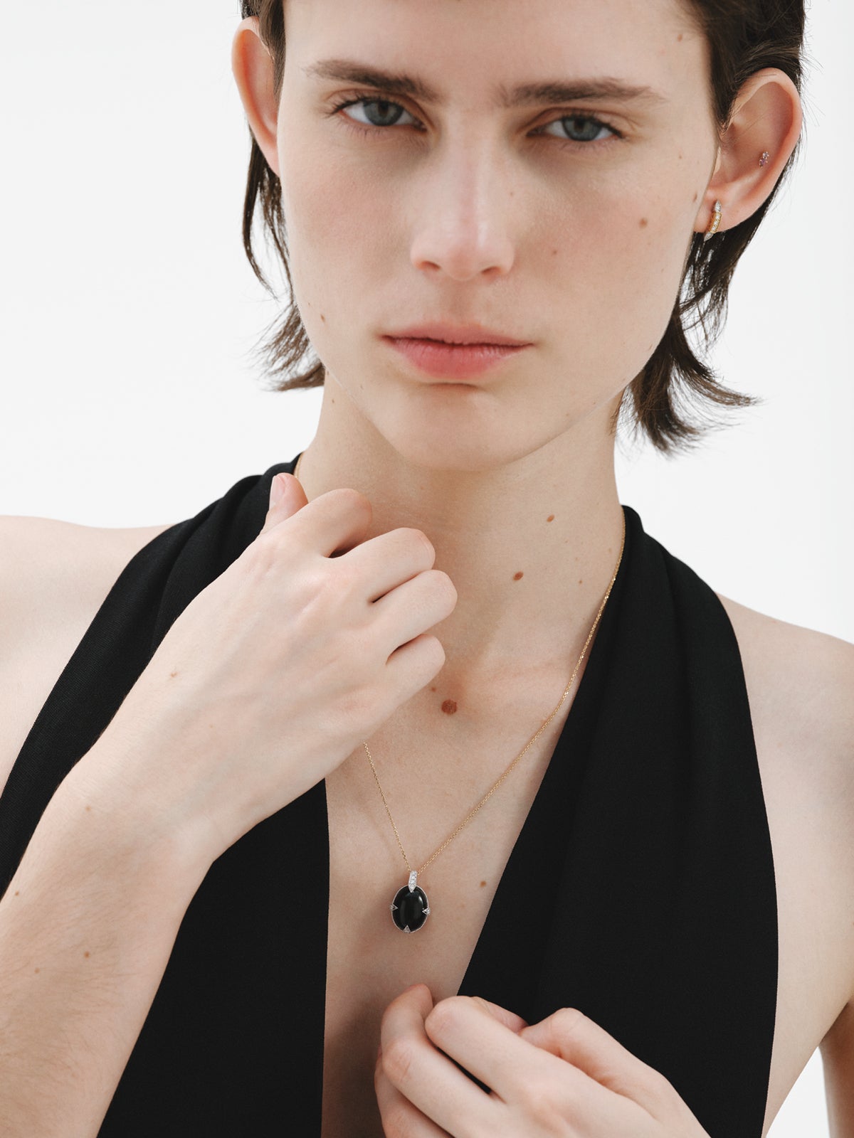 Piercing de oro amarillo de 18K con rodolita en talla pera y amatista en talla brillante