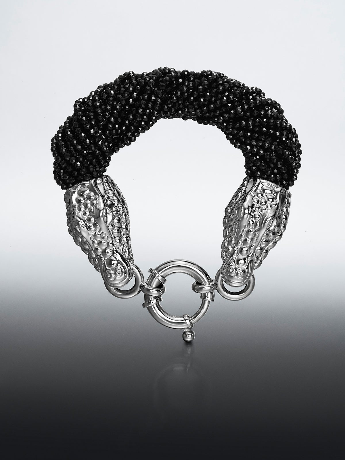 Pulsera de plata 925 y espinelas negras con forma de cabezas de cocodrilo