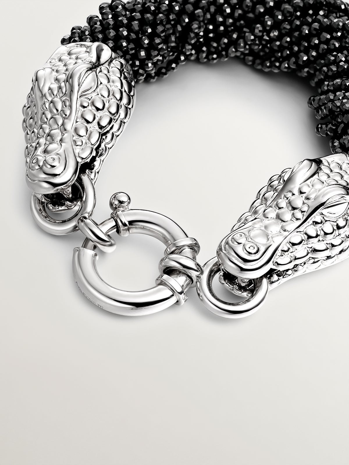 Pulsera de plata 925 y espinelas negras con forma de cabezas de cocodrilo