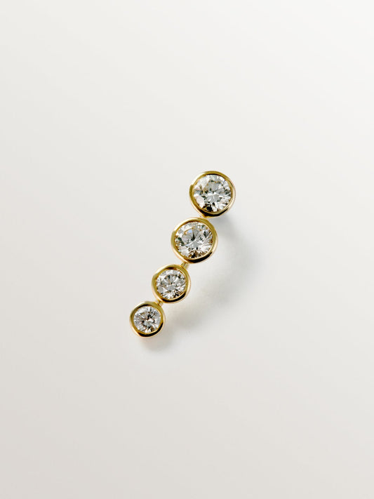 Piercing de oro amarillo de 18K y diamantes en talla brillante