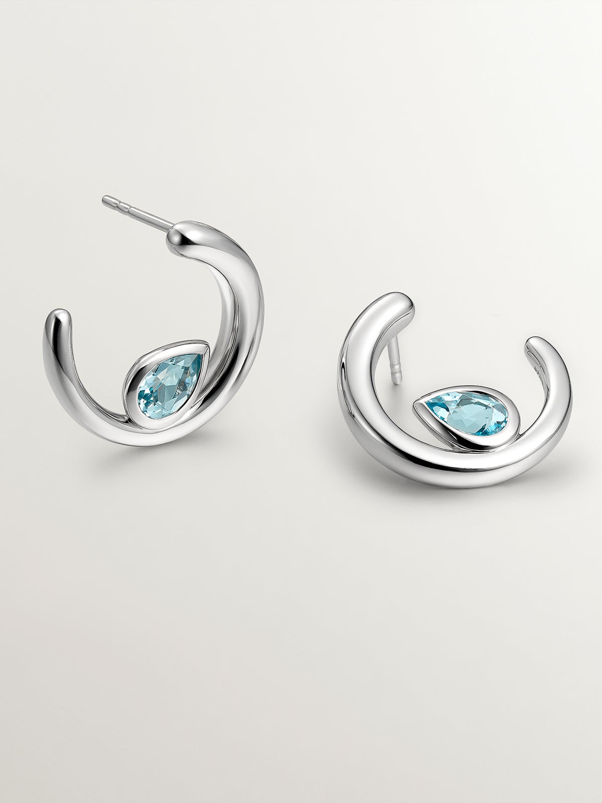 Pendientes de aro de plata 925 con 2 topacios azul sky