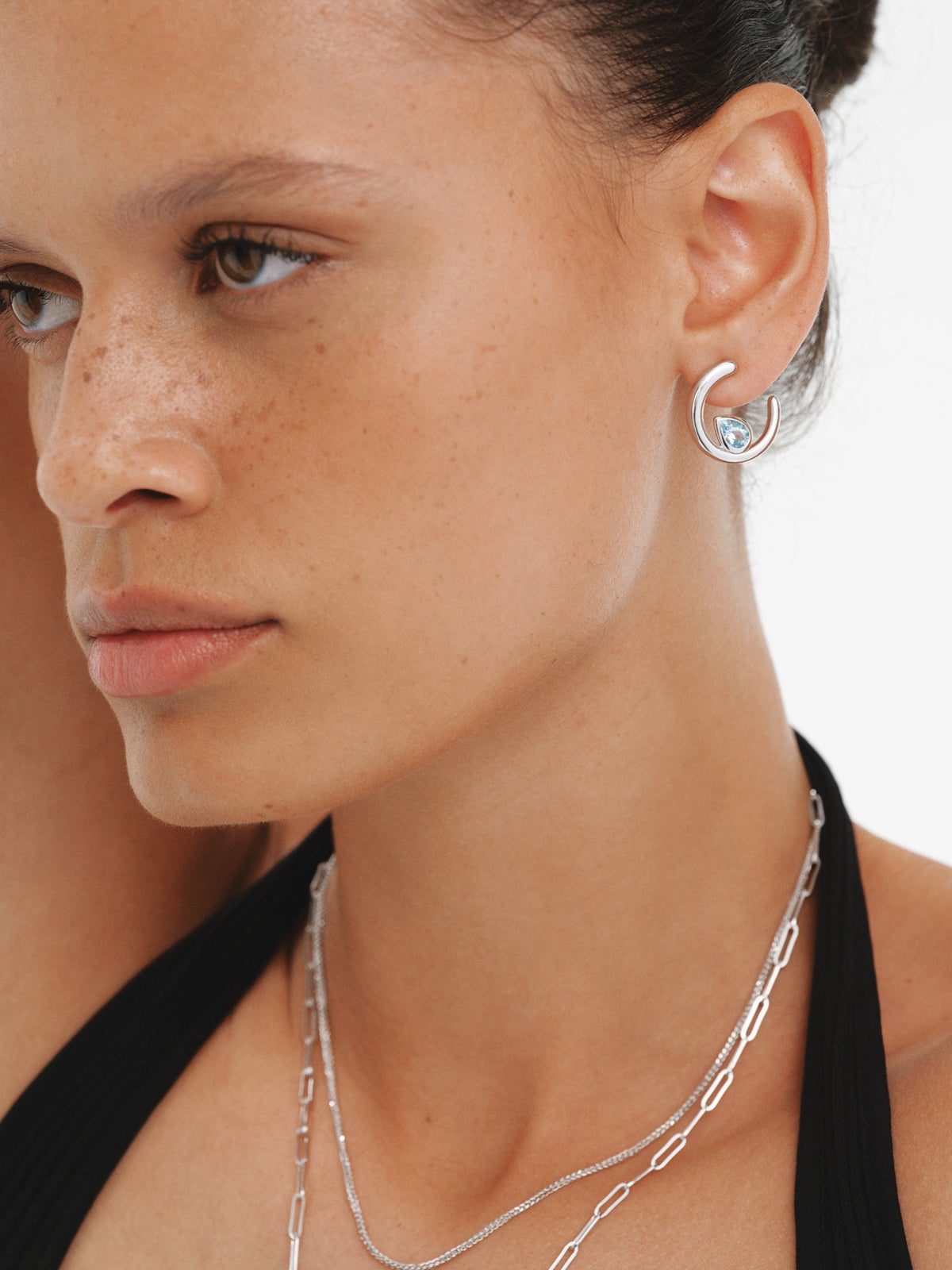 Pendientes de aro de plata 925 con 2 topacios azul sky