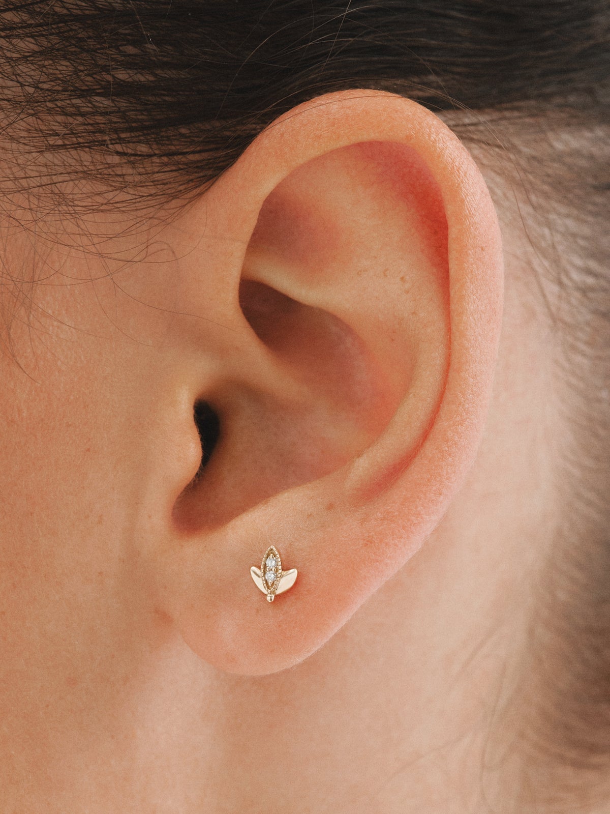 Piercing de oro amarillo de 18K con diamantes en talla brillante