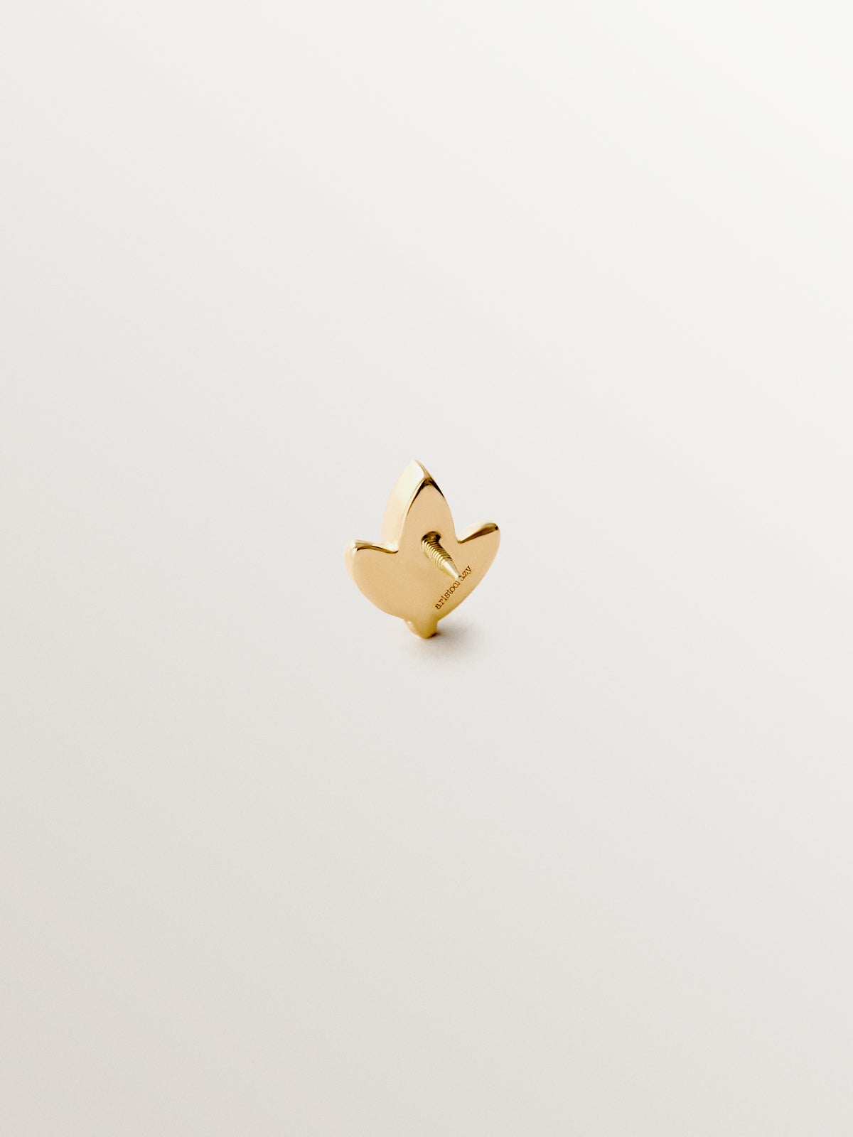 Piercing de oro amarillo de 18K con diamantes en talla brillante