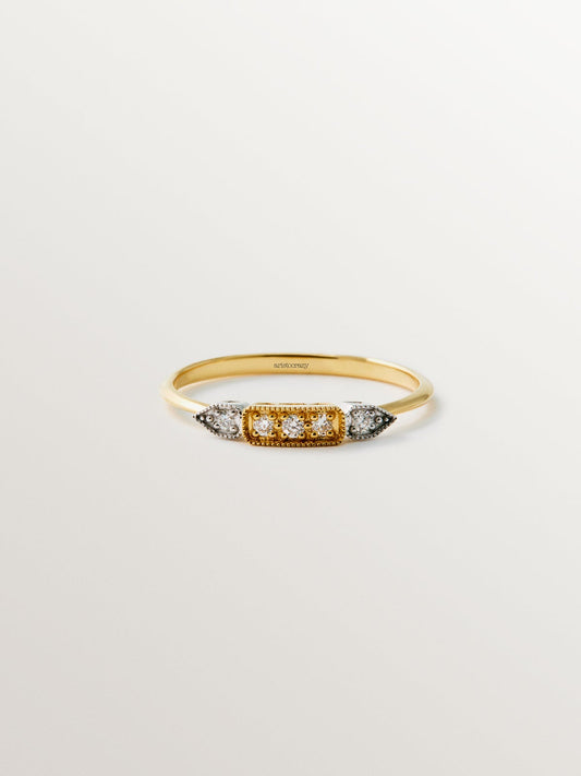 Anillo de oro blanco y amarillo de 18K con pavé de diamantes en talla brillante