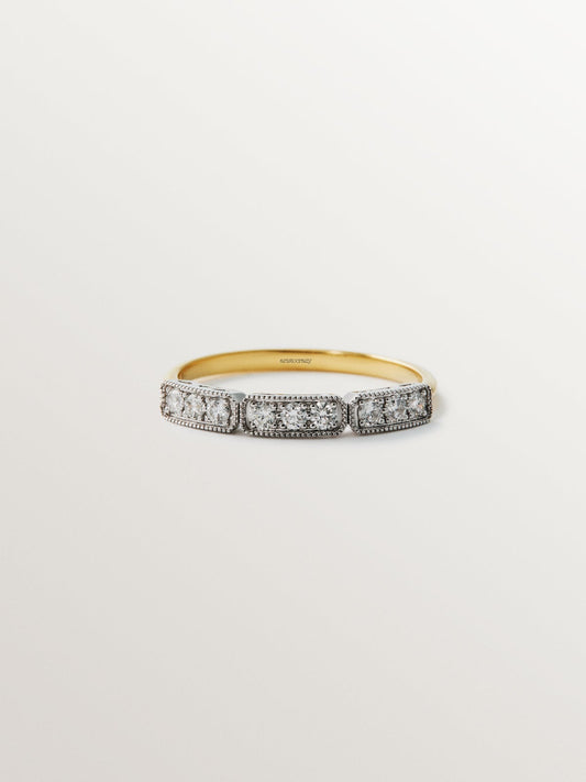 Anillo de oro blanco y amarillo de 18K con pavé de diamantes en talla brillante