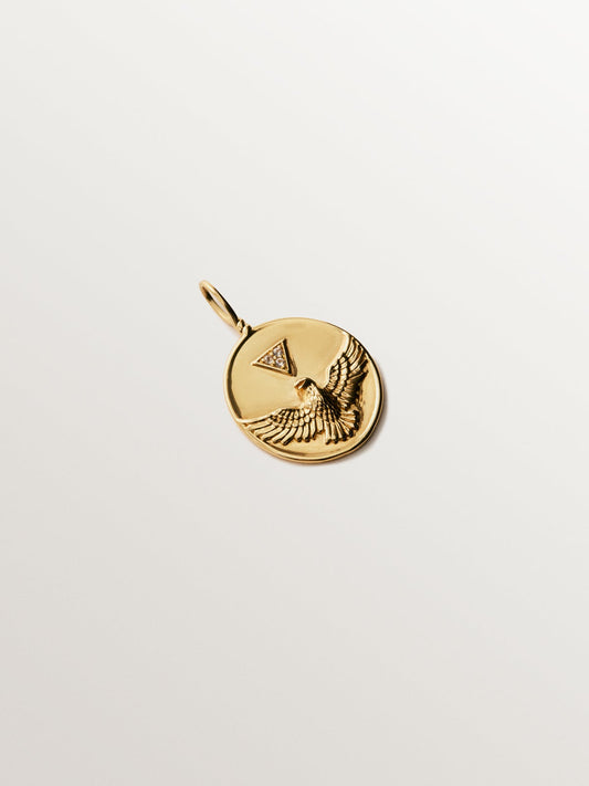 Charm de plata 925 bañada en oro amarillo de 18K con topacios blancos y motivo de pájaro