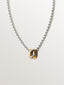 Colgante trenzado de plata 925 bañada en rodio y oro amarillo de 18K con pavé de topacios blancos