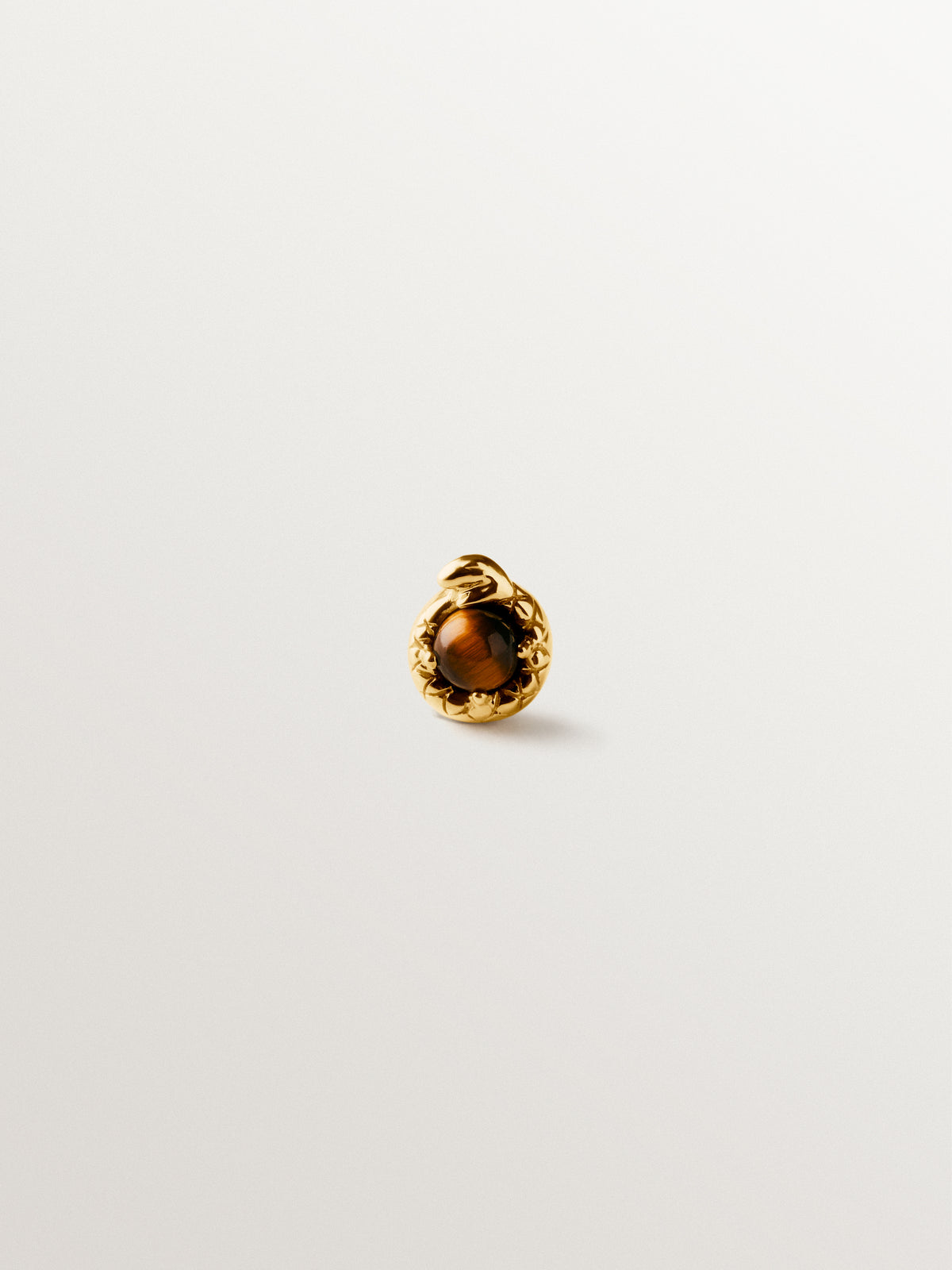 Piercing de oro amarillo de 18K con forma de serpiente y ojo de tigre